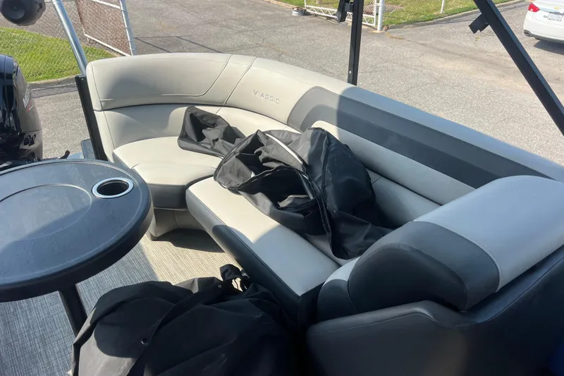 Slide: The Image of Viaggio Lago V-U 22 boat interior with seating and table, 2022 model. - 27