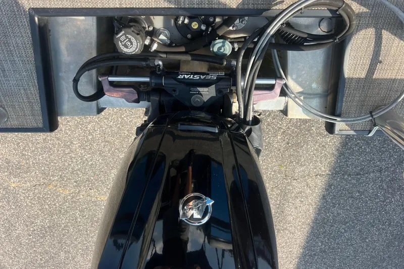 Slide: The Image of Top view of a 2022 Viaggio Lago V-U 22 boat engine and controls. - 32