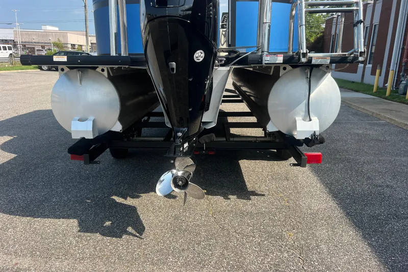 Slide: The Image of Rear view of 2022 Viaggio Lago V-U 22 pontoon boat on trailer, showcasing dual pontoons. - 8