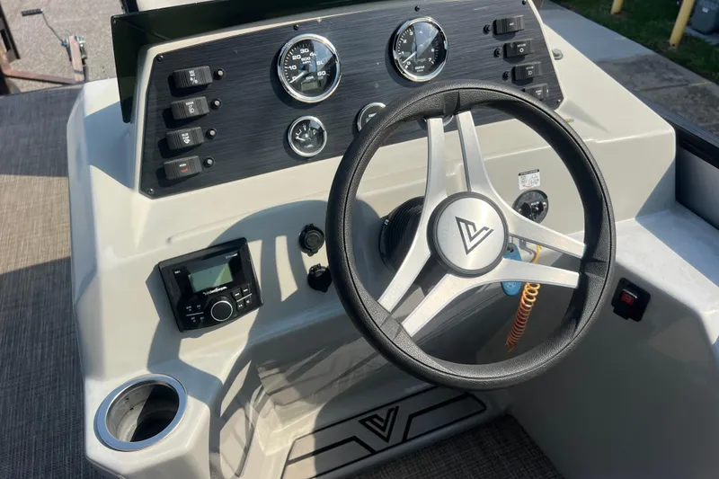 Slide: The Image of Steering console of 2022 Viaggio Lago V-U 22 boat with gauges and controls. - 25