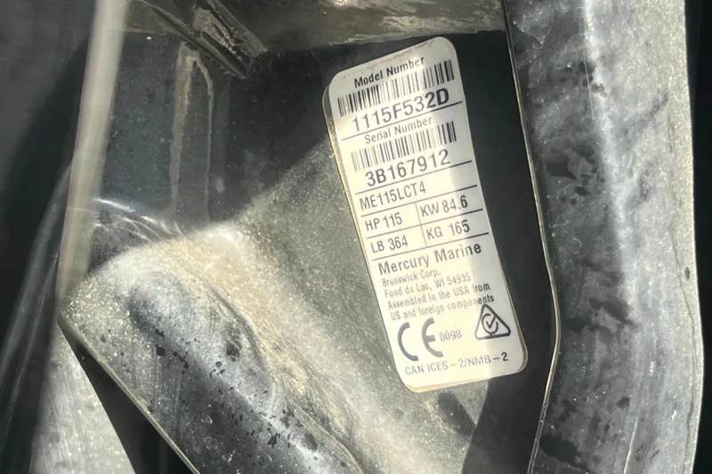 Slide: The Image of Label on Mercury Marine engine, model ME115LCT4, showing specifications and compliance details. - 47