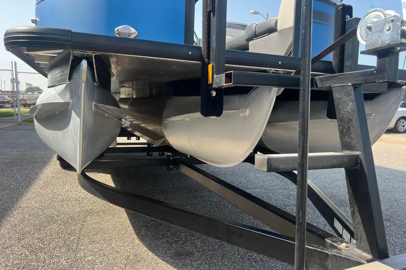 Slide: The Image of 2022 Viaggio Lago V-U 22 pontoon boat on trailer, close-up view of pontoons. - 18