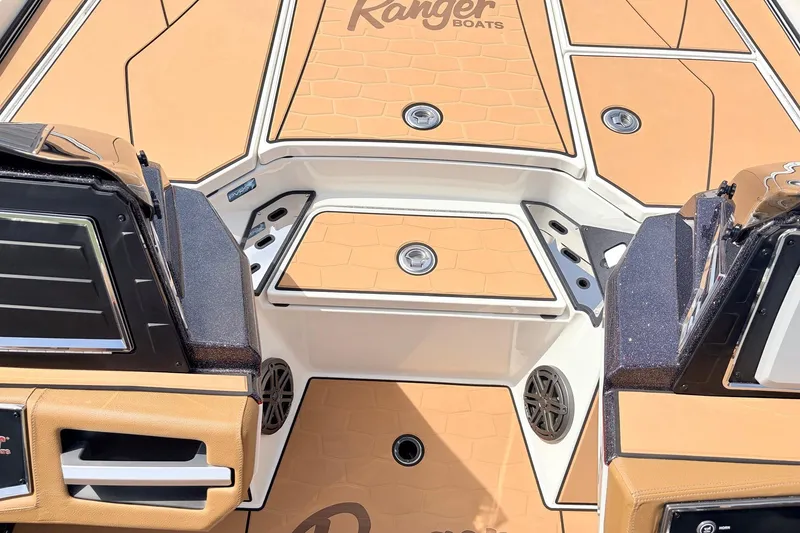 Slide: The Image of 2026 Ranger Z521R Ultra boat deck with tan and black accents. - 29