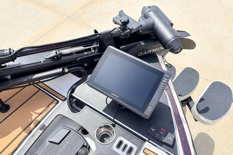 Slide: The Image of 2026 Ranger Z521R Ultra boat dashboard with Garmin navigation system and control panel. - 17