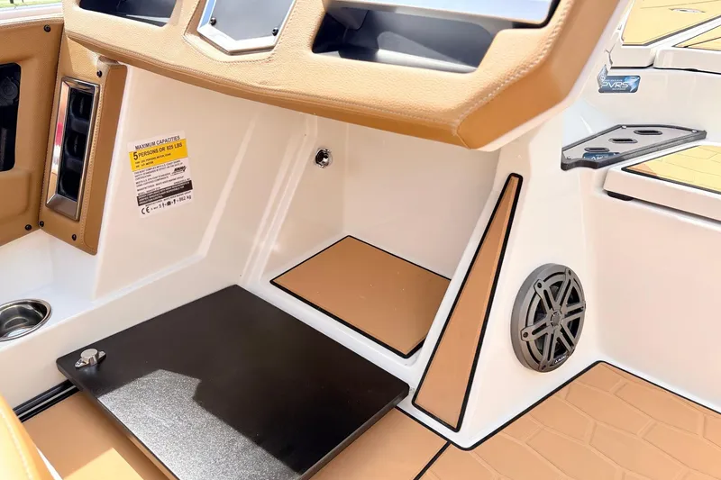 Slide: The Image of Interior of 2026 Ranger Z521R Ultra boat, featuring seating and speaker details. - 37