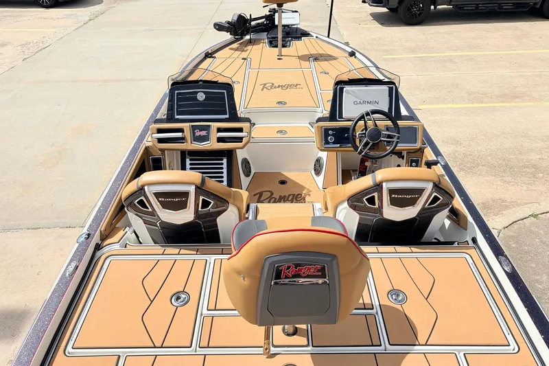 Slide: The Image of 2026 Ranger Z521R Ultra boat interior with advanced navigation systems and luxurious seating. - 12