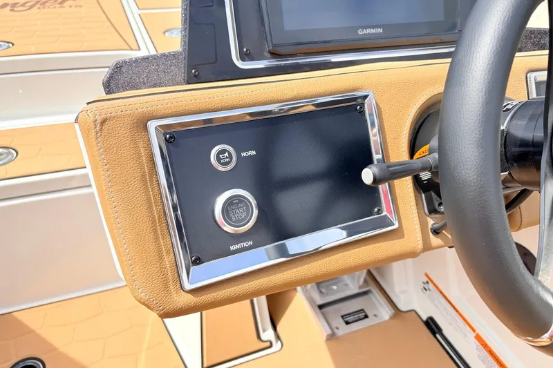 Slide: The Image of 2026 Ranger Z521R Ultra dashboard with ignition and horn controls, featuring Garmin display. - 40