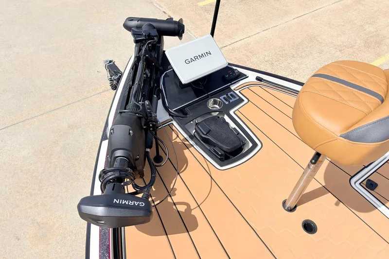 Slide: The Image of 2026 Ranger Z521R Ultra boat deck with Garmin equipment and tan seating. - 15