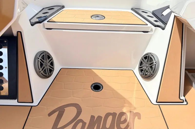 Slide: The Image of 2026 Ranger Z521R Ultra boat deck with speakers and storage compartments. - 43