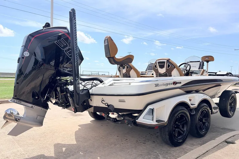 Slide: The Image of 2026 Ranger Z521R Ultra boat with powerful engine and sleek design on a trailer. - 7