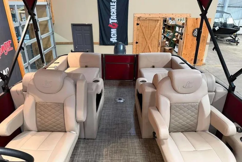 Slide: The Image of Interior of a 2020 Misty Harbor 2285RSF pontoon boat with beige seating. - 8