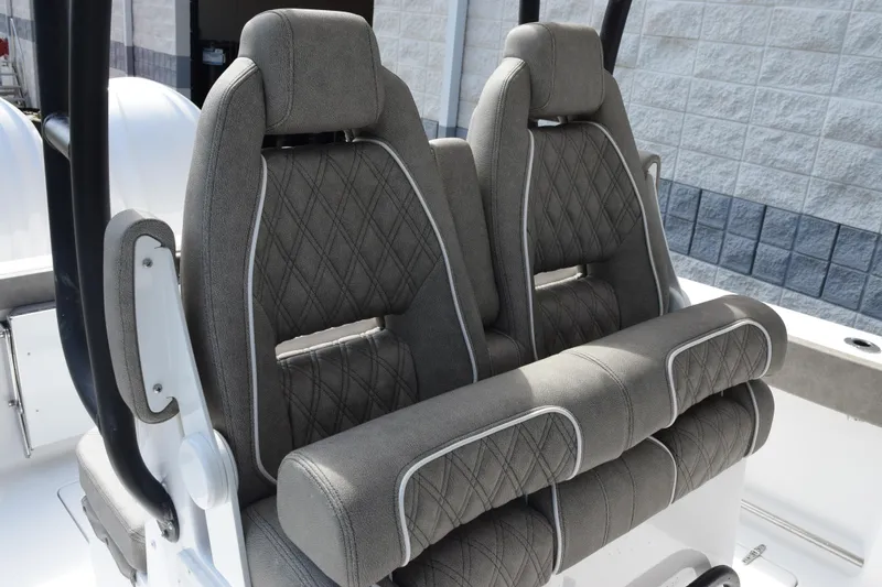 Slide: The Image of 2027 Sea Hunt Gamefish 28 boat seats with diamond-stitched upholstery and forward seating design. - 11