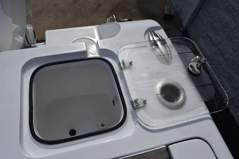Slide: The Image of 2027 Sea Hunt Gamefish 28 Forward Seating boat's livewell and sink detail. - 20