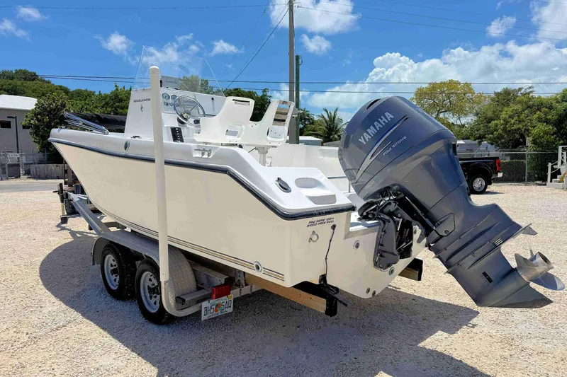 Slide: The Image of 2003 PRO SPORT 2200 Blue Water boat with Yamaha outboard motor on trailer. - 6