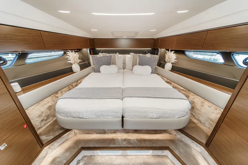 Slide: The Image of Luxurious 2017 Bavaria R40 Fly yacht bedroom with elegant decor and plush bedding. - 56