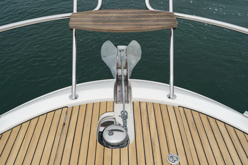 Slide: The Image of Bow of 2017 Bavaria R40 Fly yacht with anchor and teak deck. - 10