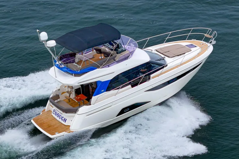 Slide: The Image of 2017 Bavaria R40 Fly yacht cruising on open water, showcasing sleek design and luxury features. - 5
