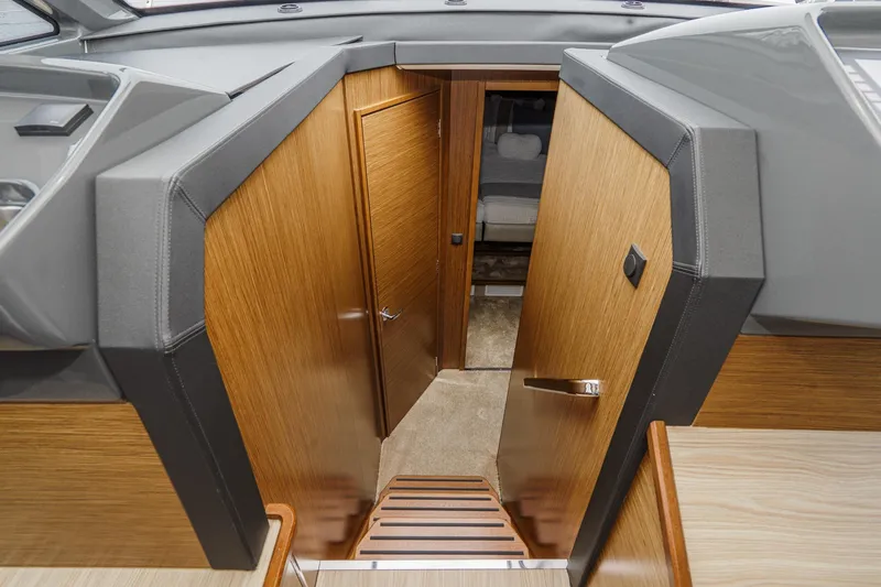 Slide: The Image of Interior view of 2017 Bavaria R40 Fly yacht, featuring wooden doors and modern design. - 48
