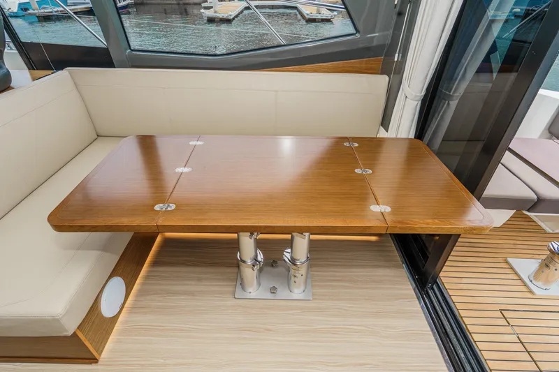 Slide: The Image of Luxurious interior of 2017 Bavaria R40 Fly yacht with elegant wooden table and seating. - 37