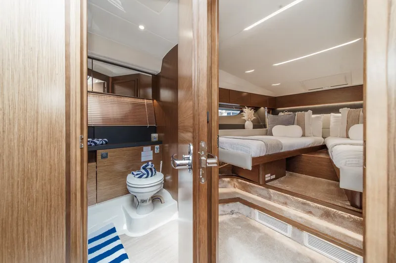 Slide: The Image of Luxurious interior of 2017 Bavaria R40 Fly yacht featuring cozy bedroom and modern bathroom. - 59