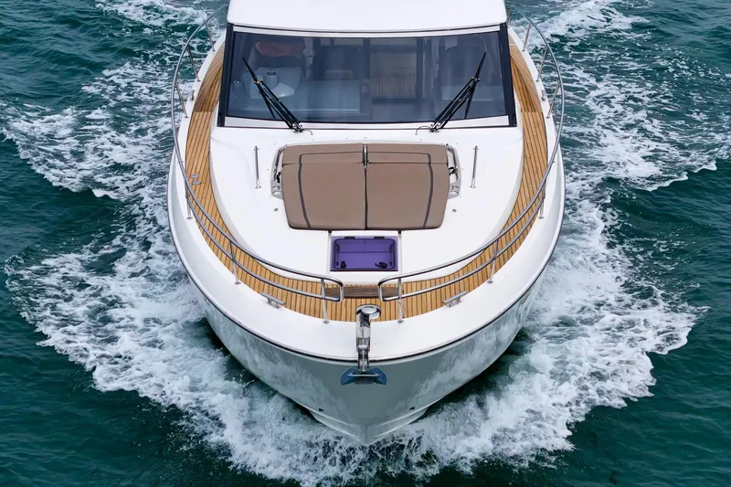 Slide: The Image of 2017 Bavaria R40 Fly yacht cruising on open water, aerial view. - 9