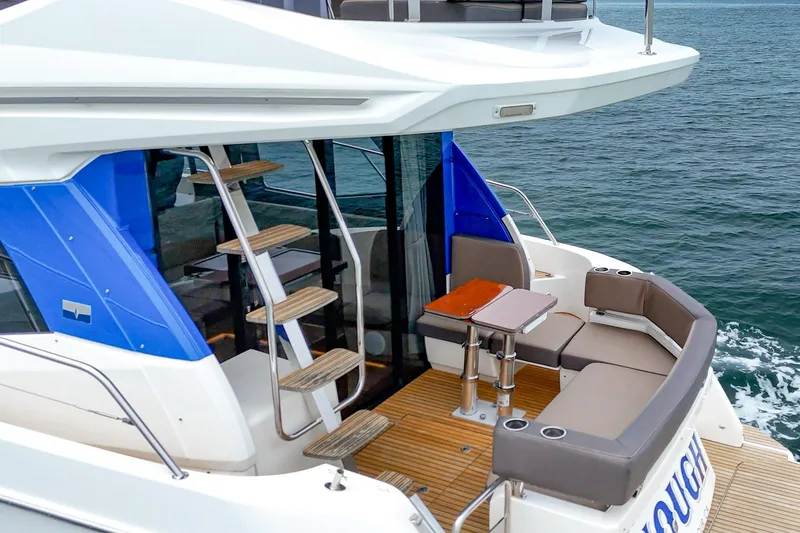 Slide: The Image of Luxurious 2017 Bavaria R40 Fly yacht with elegant seating and ocean view. - 20
