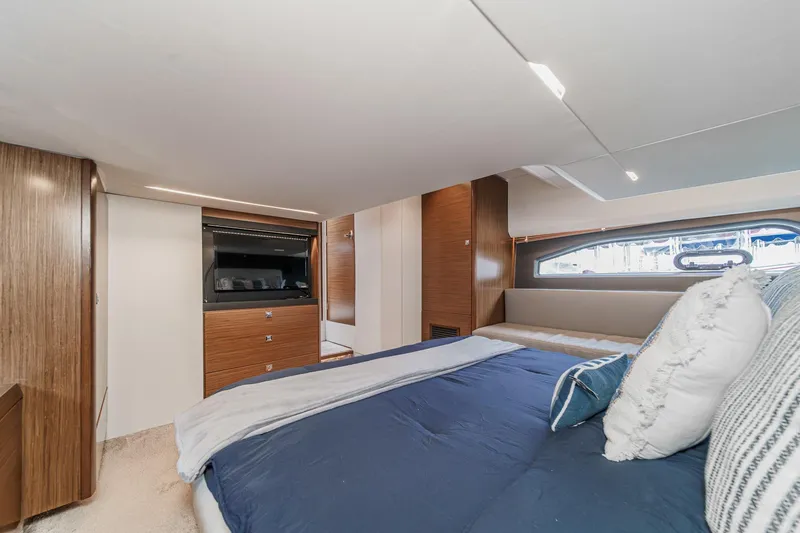 Slide: The Image of Luxurious interior of 2017 Bavaria R40 Fly yacht bedroom with modern design and cozy bedding. - 53