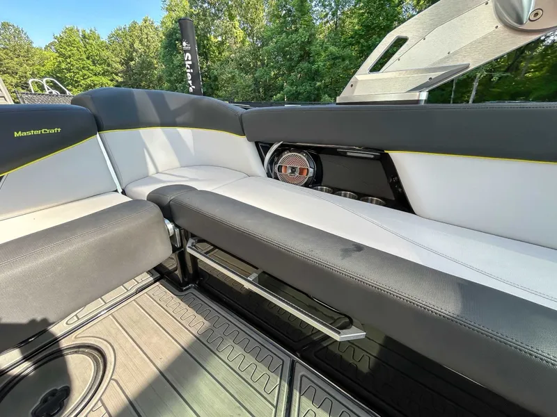Slide: The Image of Interior of a 2020 MasterCraft XT23 with stylish seating and speakers. - 20