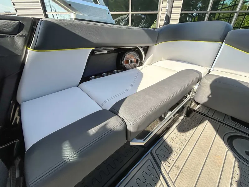 Slide: The Image of Interior of a 2020 MasterCraft XT23 with modern seating and speakers. - 19