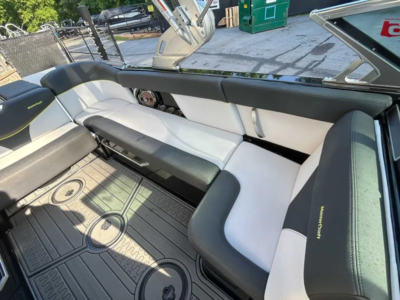 Slide: The Image of Interior of a 2020 MasterCraft XT23 with stylish seating and modern design. - 15