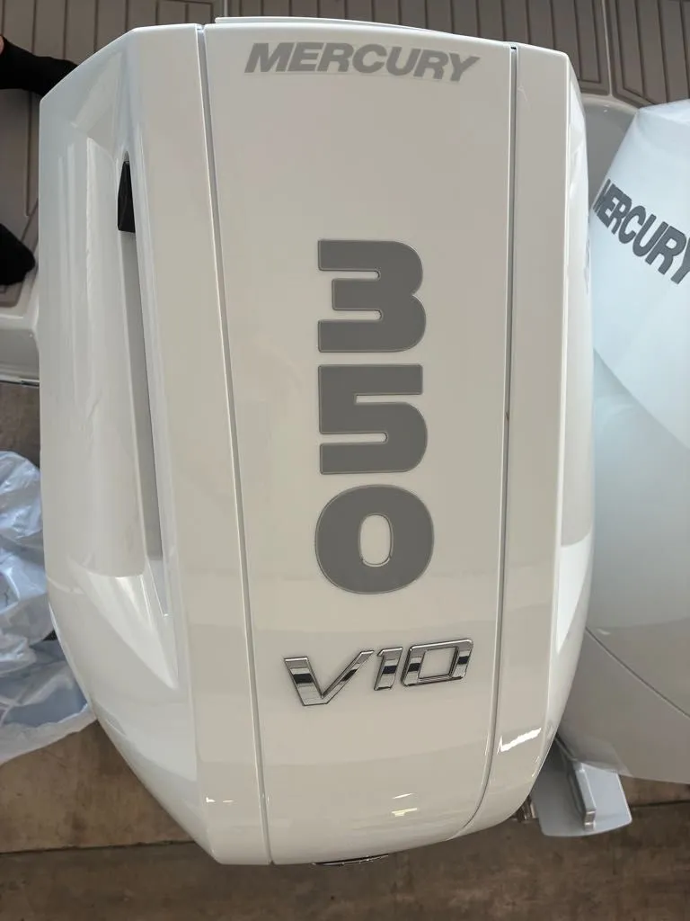 Slide: The Image of A Mercury 350 V10 outboard motor is visible, mounted on a boat. - 8