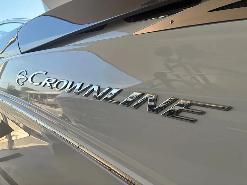 Slide: The Image of Close-up of the Crownline logo on a boat. - 20