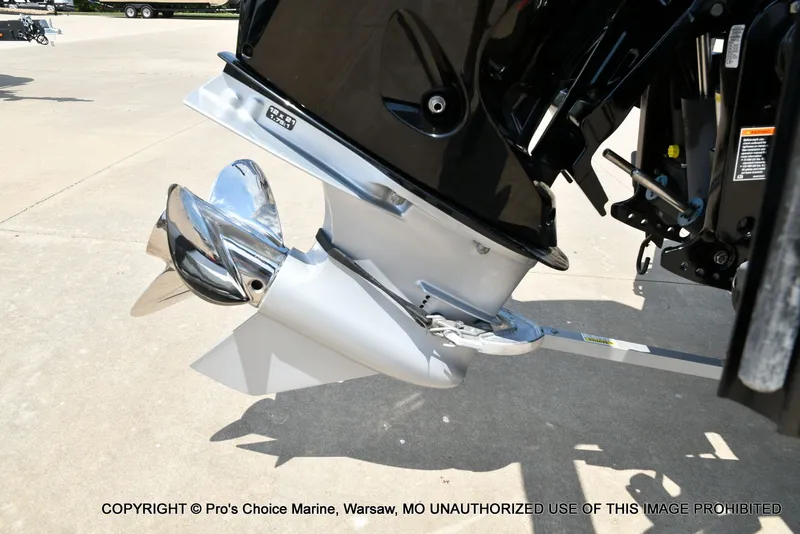 Slide: The Image of Close-up of a shiny boat propeller on an outboard motor. - 29