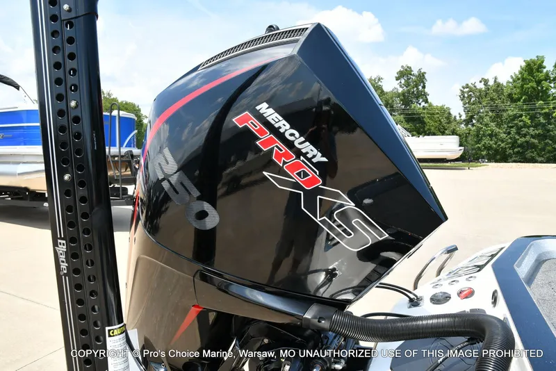 Slide: The Image of Close-up of a Mercury Pro XS outboard motor on a Ranger boat. - 28