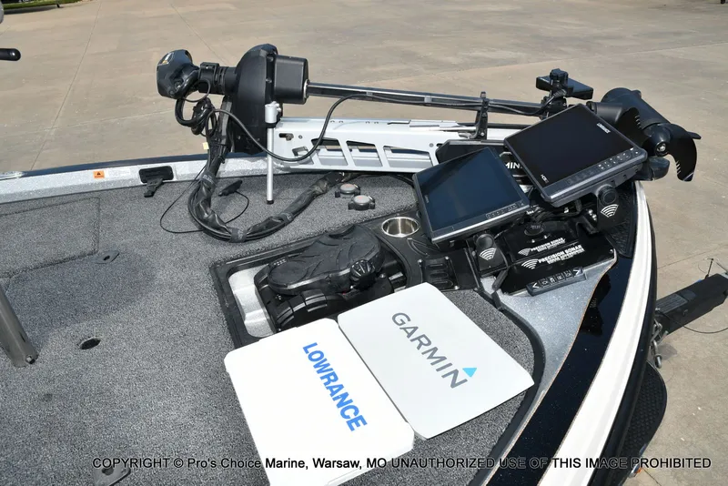 Slide: The Image of The image shows the cockpit of a Ranger Z521L CUP boat with modern navigation equipment. - 4