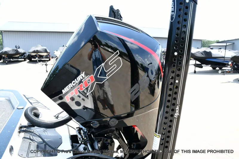 Slide: The Image of Close-up of a Mercury Pro XS outboard motor on a Ranger boat. - 31
