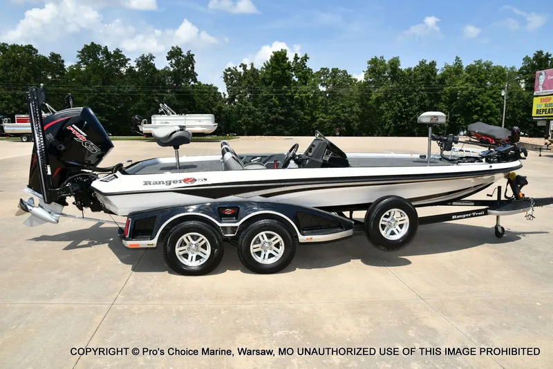 Slide: The Image of 2021 Ranger Z521L CUP on a trailer, parked on a concrete lot. - 26