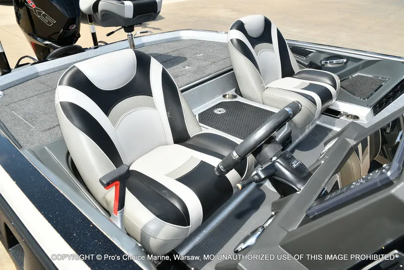 Slide: The Image of Interior view of a 2021 Ranger Z521L CUP boat with two cushioned seats. - 20