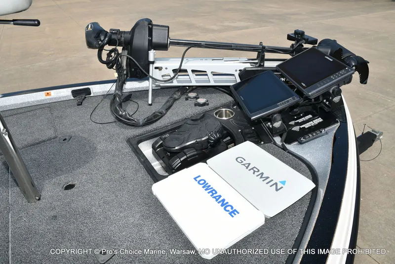 Slide: The Image of The image shows the cockpit of a 2021 Ranger Z521L CUP boat with Garmin and Lowrance equipment. - 41