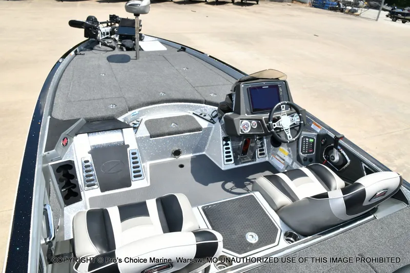 Slide: The Image of The image shows the cockpit of a 2021 Ranger Z521L CUP boat with modern controls. - 47