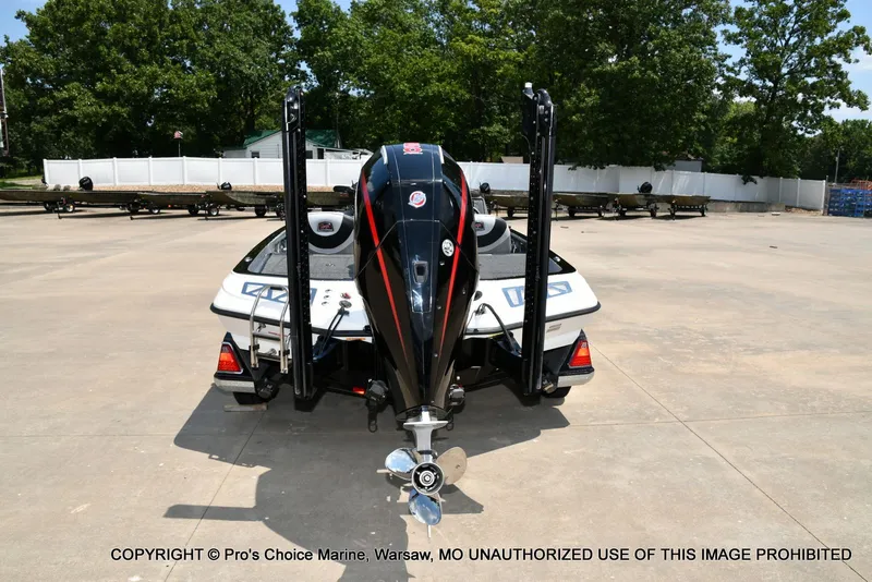 Slide: The Image of Ranger Z521L CUP 2021 on a trailer, featuring a powerful outboard motor. - 11