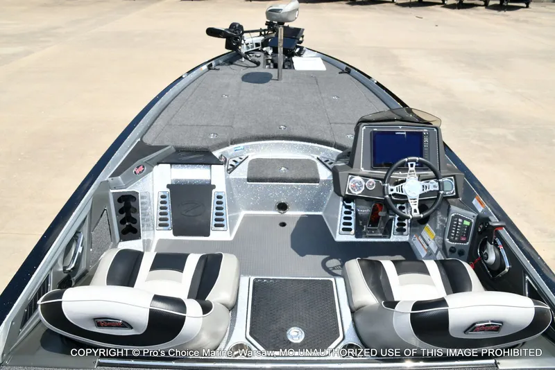 Slide: The Image of The image shows the cockpit of a 2021 Ranger Z521L CUP boat with modern controls. - 48