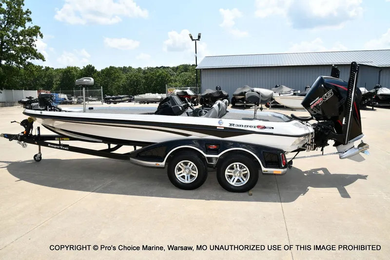 Slide: The Image of A 2021 Ranger Z521L CUP on a trailer in a parking lot. - 33