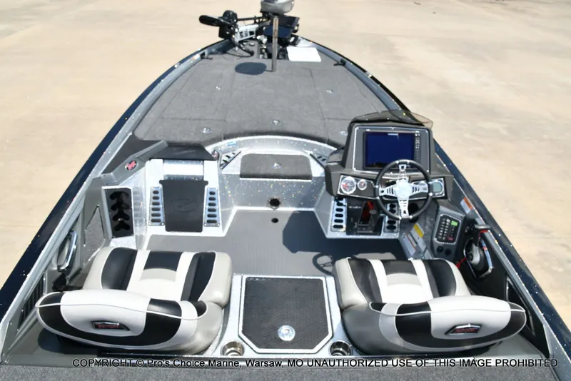 Slide: The Image of The image shows the cockpit of a 2021 Ranger Z521L CUP boat with two seats and a helm. - 12