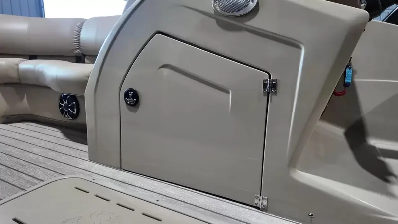 Slide: The Image of Interior of a 2019 Silver Wave 230 Island CLS with beige upholstery and speaker. - 36