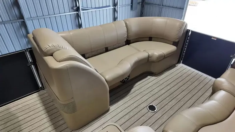 Slide: The Image of Interior of the 2019 Silver Wave 230 Island CLS with beige leather seating. - 22