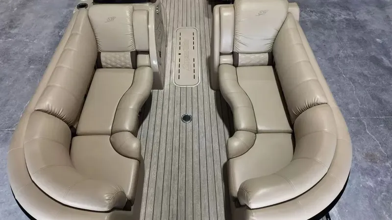 Slide: The Image of Interior view of a 2019 Silver Wave 230 Island CLS with beige leather seating. - 21