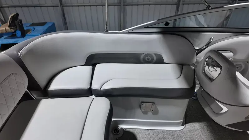 Slide: The Image of Interior of a 2021 Crownline Eclipse E215 XS with gray upholstery and modern design. - 38