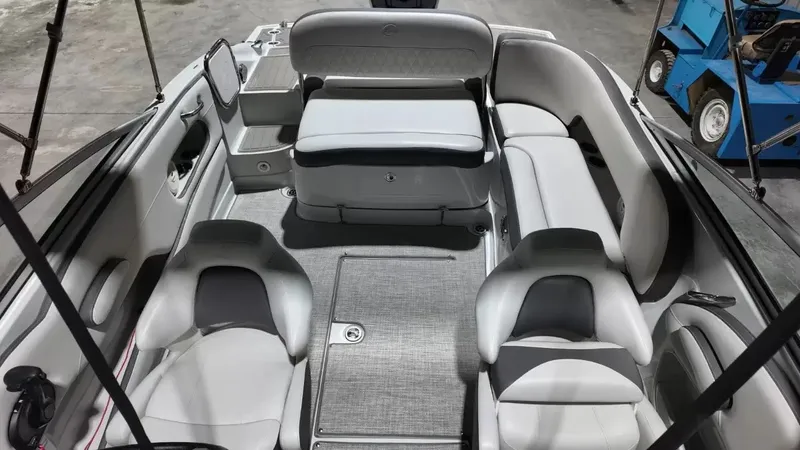 Slide: The Image of Interior view of a Crownline Eclipse E215 XS boat with gray and white seating. - 41