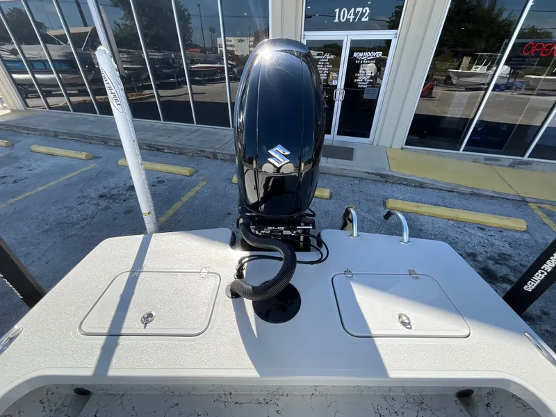 Slide: The Image of The image shows the stern of a Majek 20 Xtreme boat with an outboard motor. - 7